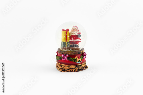 Christmas snow globe with Santa on the white background.