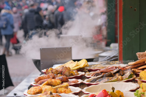 Street trading Christmas grilled meat and vegetable snacks