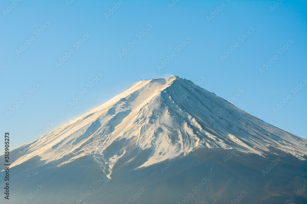 Mount Fuji has snow at the peak of a beautiful winter in Japan.