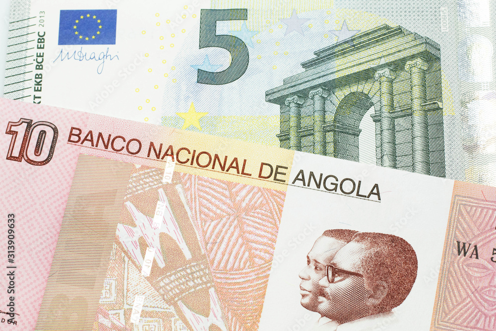 A colorful ten kwanza bill from Angola with a blue and green, European