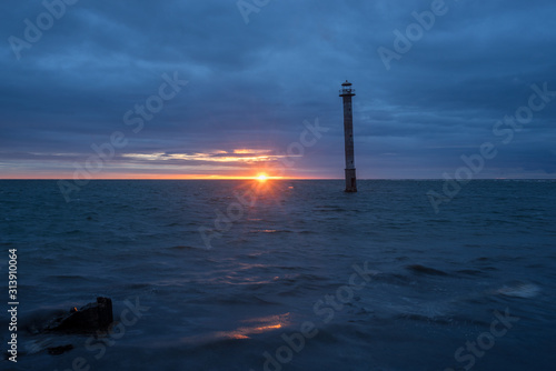 Skew lighthouse in the Baltic Sea. Kiipsaar, Harilaid, Saaremaa, Estonia, Europe. photo