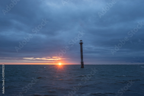 Skew lighthouse in the Baltic Sea. Kiipsaar, Harilaid, Saaremaa, Estonia, Europe. photo