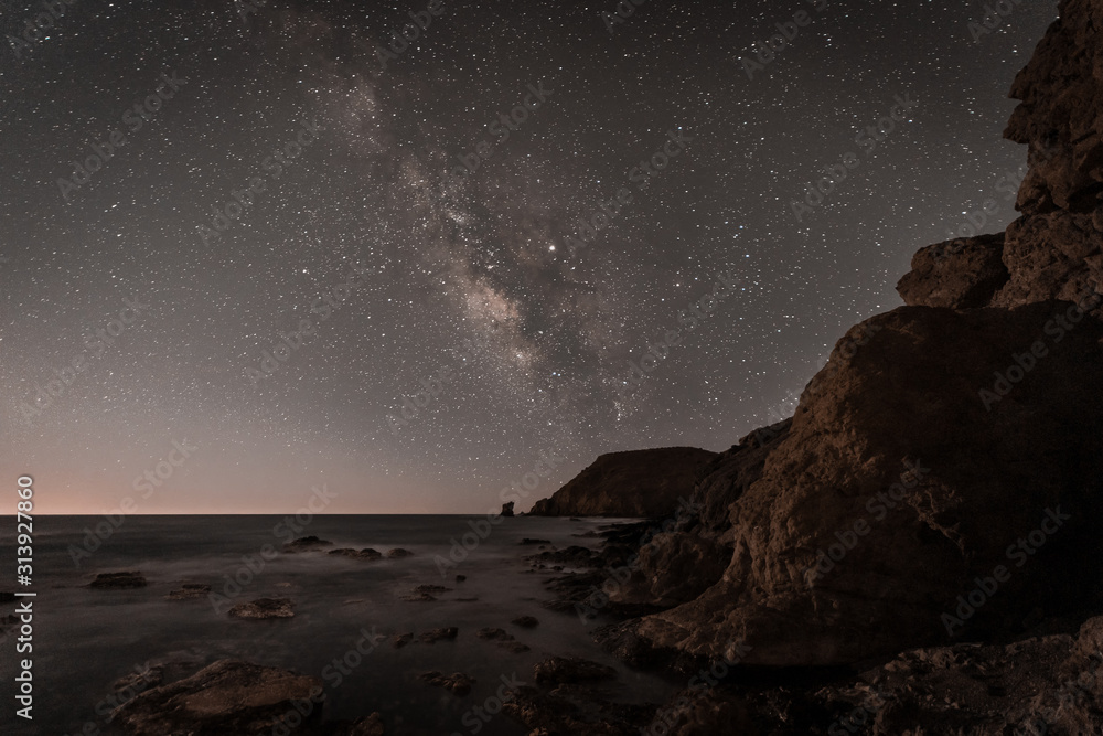 Night landscape with Milky Way on the coast of the Escullos. Natural Park of Cabo de Gata. Spain. Night landscape with Milky Way on the coast of the Escullos. Natural Park of Cabo de Gata. Spain.