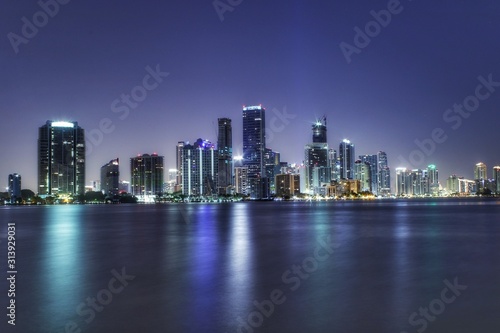 urban city skyline at night, brickell, miami florida, long exposure