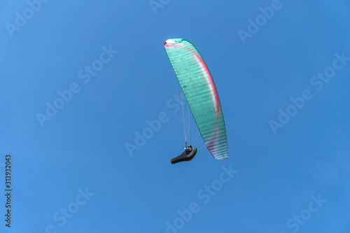 Paragliders over Longues-sur-Mer, Normandy