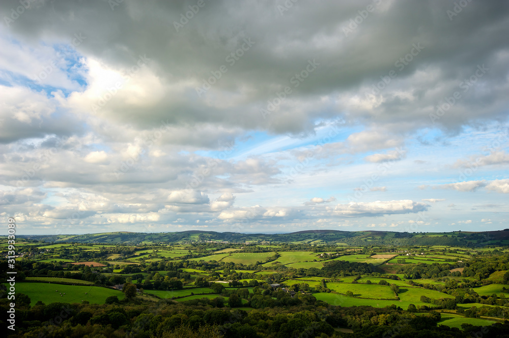 Panoramic view of rolling green English patchwork countryside in Devon, UK