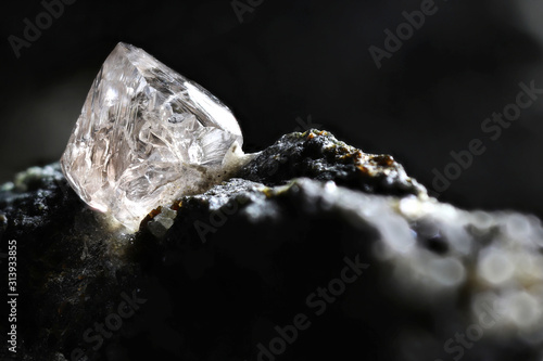 natural diamond nestled in kimberlite photo