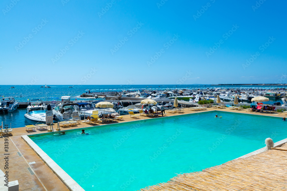 View on San Felice Circeo sea bay with swimming pool and pier, Lazio, Italy View on San Felice Circeo sea bay with swimming pool and pier, Lazio, Italy