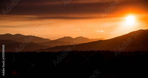 Wallpaper Mural Wildfire smoke obscures the sun and creates an eerie mood at sunset. Torontodigital.ca
