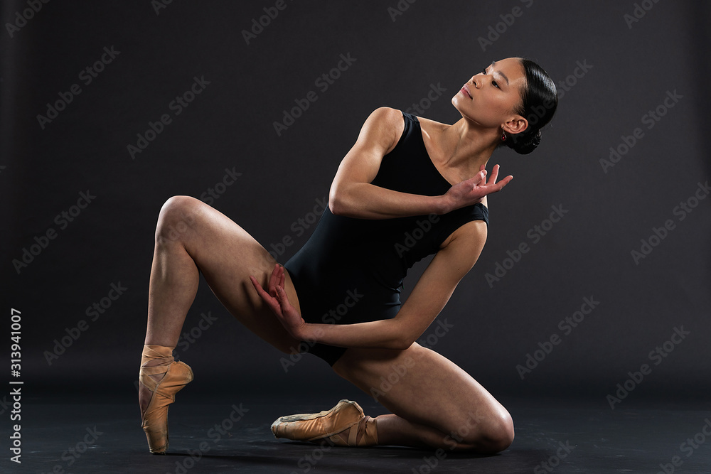 Teenage Asian girl in ballet dance pose for portrait - obrazy, fototapety, plakaty 