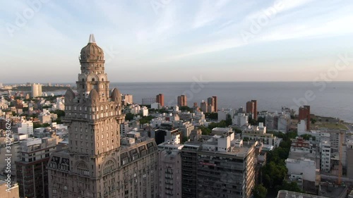 Montevideo, Uruguay, aerial view of cityscape showing architectural landmark Palacio Salvo in the Old City at sunset. 