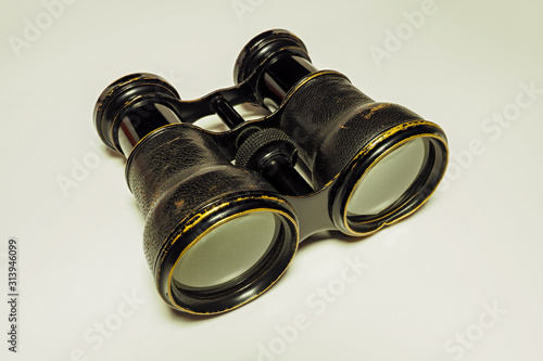 Very old theater binoculars on a white background.