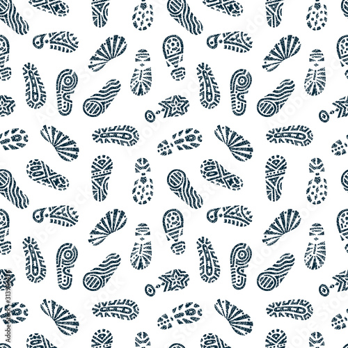 Grunge footprints Seamless pattern. Hand drawn doodles shoe tracks - Vector illustration. Black and white background.
