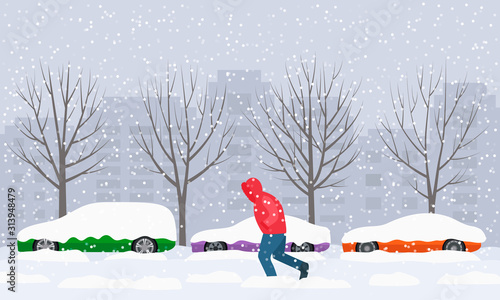 The road in the city swept after heavy snow and hail. parked cars on the street in snowdrifts and snow.