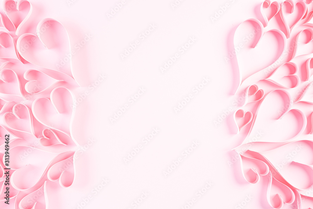 Pink paper hearts on Light pink pastel paper background. Love and Valentine's day concept. Pink paper hearts on Light pink pastel paper background. Love and Valentine's day concept.