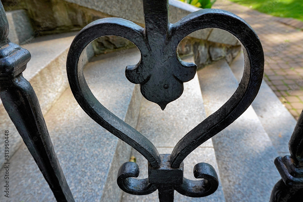 Wrought iron fence with heart shaped ornaments