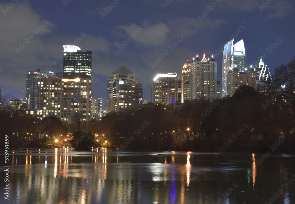 Midtown Atlanta skyline and reflecting lake at Piedmont Park 