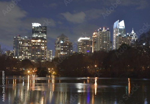 Midtown Atlanta skyline and reflecting lake at Piedmont Park 