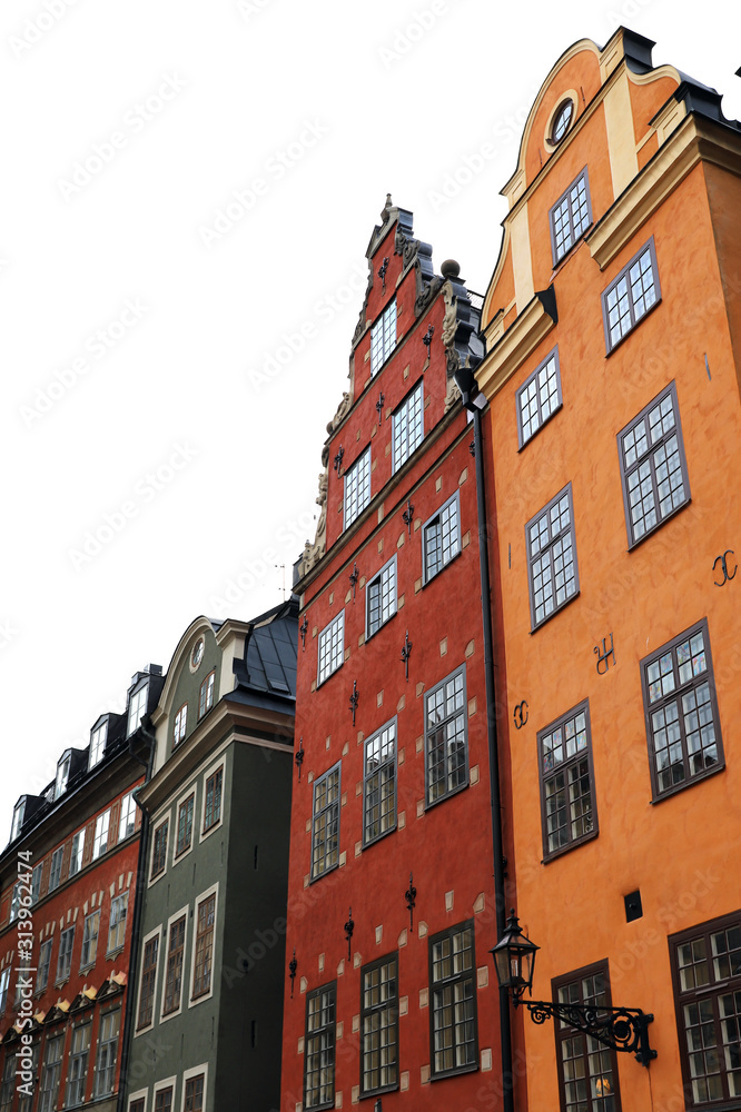 Typical Gamla Stan houses in red and orange colors in the autumn in Stockholm Sweden
