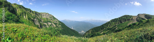 Fototapeta Naklejka Na Ścianę i Meble -  Beautiful summer panorama in Caucasus mountains. Roza Khutor, Russia