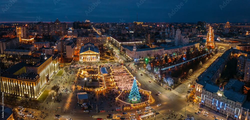 Street illumination during new year celebration in central square of Lenin in Voronezh, Russia, aerial view