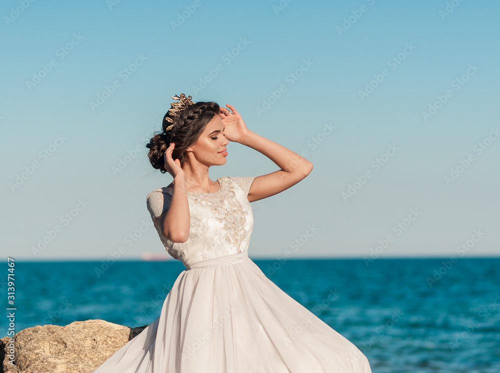 Beauty fashion bride with bouquet of flowers in her hands. Beautiful Bride portrait wedding makeup and hairstyle. Fashion bride model in luxury wedding dress. Beauty fashion bride with bouquet of flowers in her hands. Beautiful Bride portrait wedding makeup and hairstyle. Fashion bride model in luxury wedding dress.