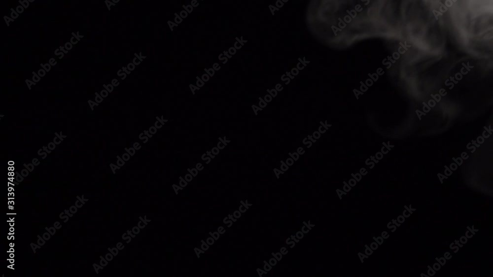 Motion of white steam smoke overlay effect on solid black background with abstract blur swirl wave motion for pollution, wildfire, vapor cigarette, gas, dry ice, warm hot food, boilling noodle soup Motion of white steam smoke overlay effect on solid black background with abstract blur swirl wave motion for pollution, wildfire, vapor cigarette, gas, dry ice, warm hot food, boilling noodle soup