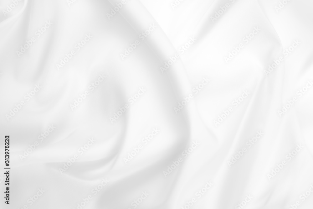 Abstract white fabric texture background. Cloth soft wave. Creases of satin, silk, and cotton.