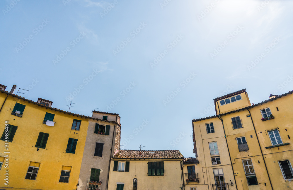 Traditional colorful ancient Italian architecture houses in Lucca