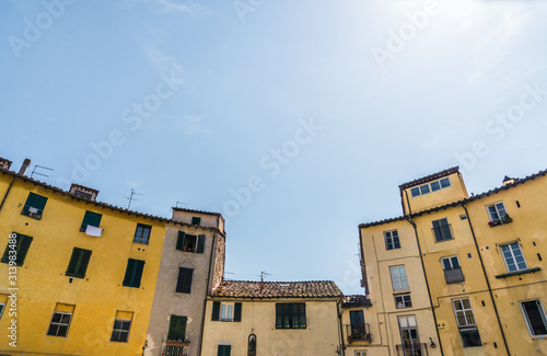 Traditional colorful ancient Italian architecture houses in Lucca