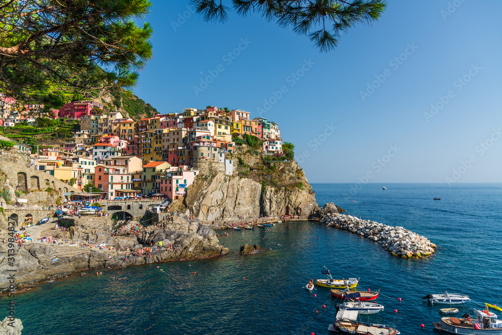 View at Manarola village in Cinque Terre, Italy, with its traditional colorful houses and Ligurian Sea coast