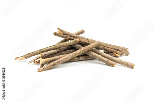 Stacked small wooden bars isolated on white background