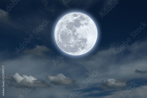 Full moon with blurred cloud at night.