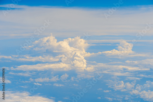 View of clouds and sky from airplane window