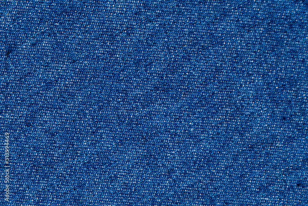 Fototapeta premium Detail of nice blue jeans textile tuxture for background with vintage tone.