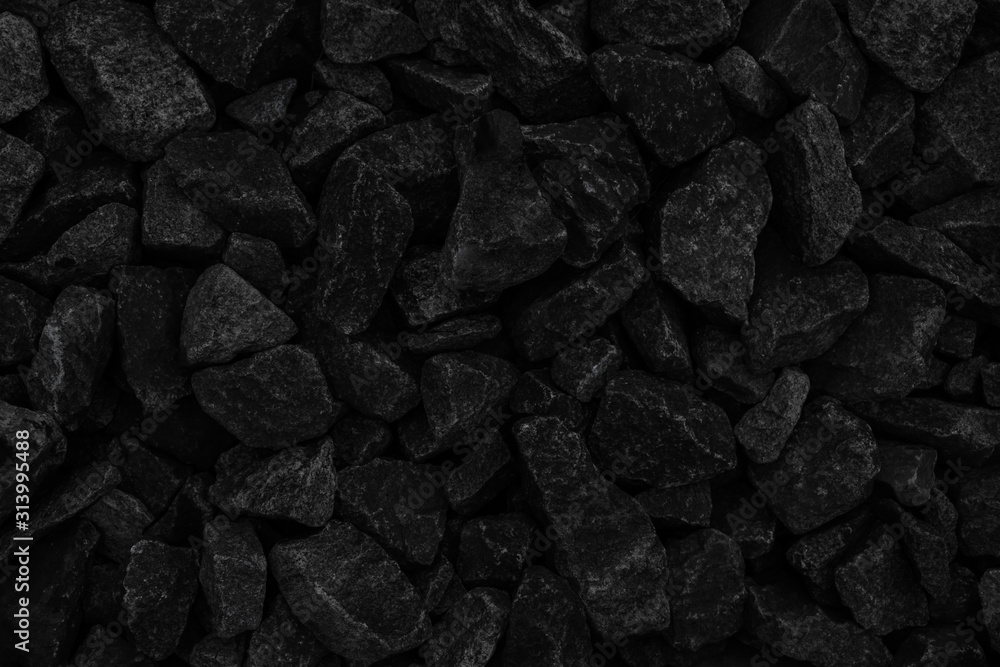 Natural fire ashes with dark grey black coals texture. It is a flammable black hard rock. Space for text. Natural fire ashes with dark grey black coals texture. It is a flammable black hard rock. Space for text.