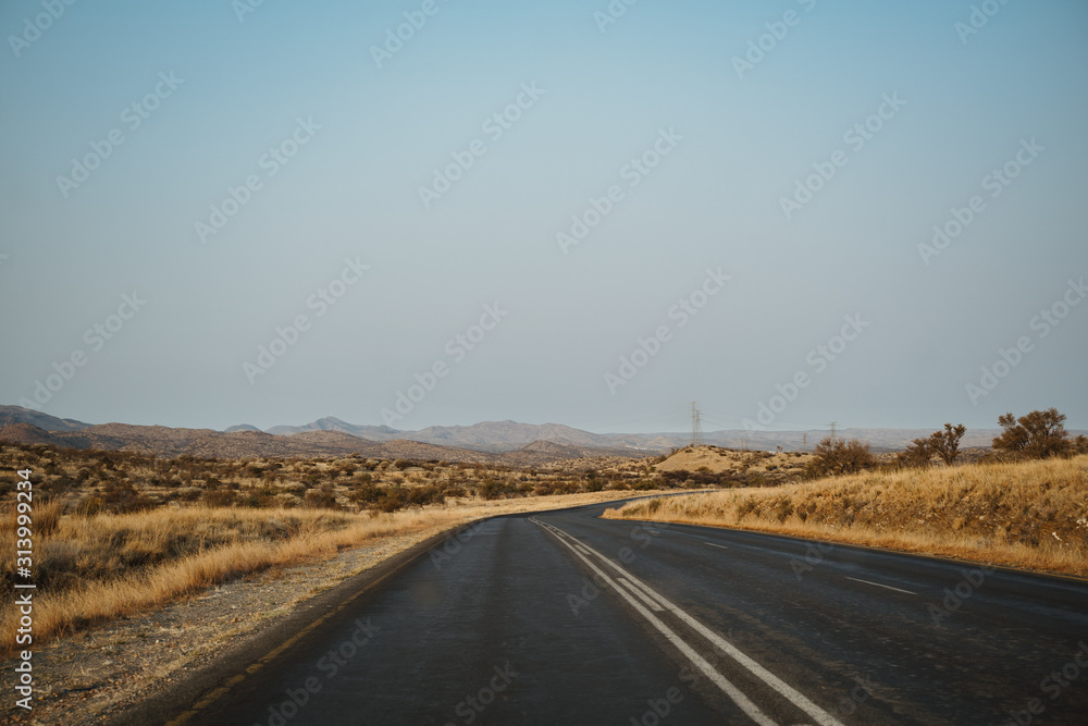 view out of a car on lonely road in Namibia