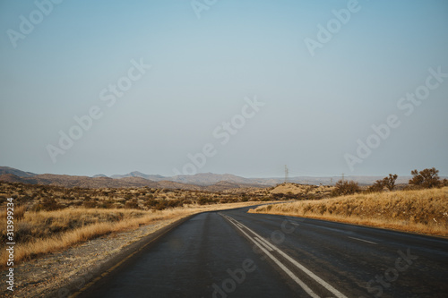 view out of a car on lonely road in Namibia