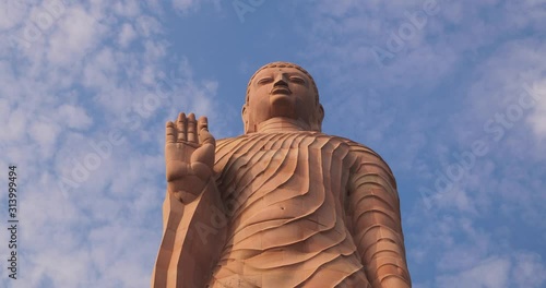 Wallpaper Mural Close up shot of tall Buddha statue in Sarnath temple in Varanasi, Uttar Pradesh, India Torontodigital.ca