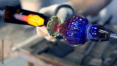  glassblower. craft manufacturing of glass products