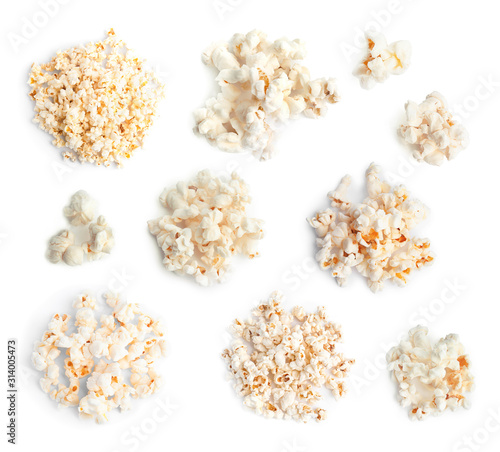 Set of tasty pop corn on white background, top view