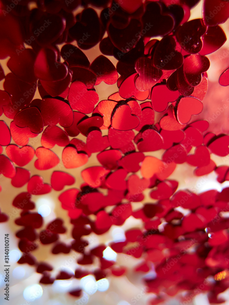 hearts confetti on the golden background hearts confetti on the golden background