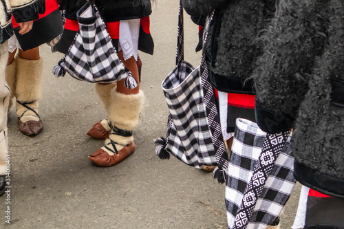 Sighetu Marmatiei, Romania: Maramures traditional costumes. Traditional Romanian peasant sandals which is worn with the Romanian peasant costume at Winter Customs and Traditions Marmatia Festival