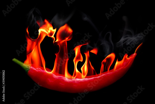 Red Hot chili pepper on fire and smoke photo