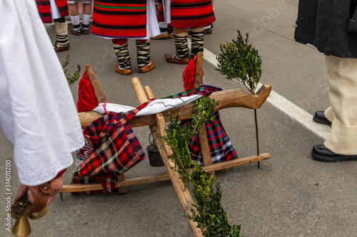 Sighetu Marmatiei, Romania: Maramures traditional costumes. Traditional Romanian peasant sandals which is worn with the Romanian peasant costume at Winter Customs and Traditions Marmatia Festival
