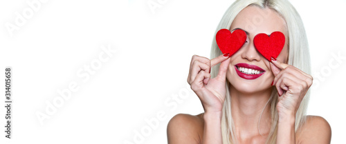 Valentine's day. Happy woman with red hearts in her eyes with a smile on a white background. Isolate. Wallpaper, flyers, invitations, posters, brochures, banners.