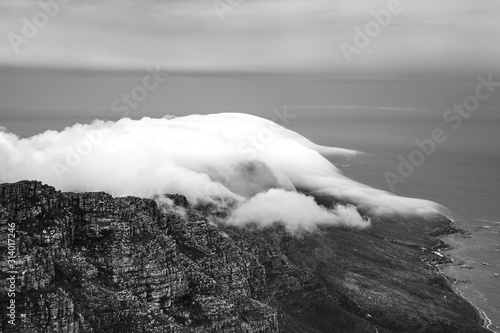Clouds rolling over Table Mountain in Cape Town, Southafica. This fenomenon is called Tablecloth.