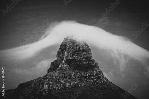 Clouds rolling over Table Mountain in Cape Town, Southafica. This fenomenon is called Tablecloth.