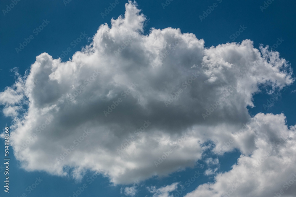 Summer landscape. White clouds against a blue sky. Summer landscape. White clouds against a blue sky.