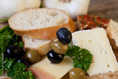 Snack With Olives And Cheese photo